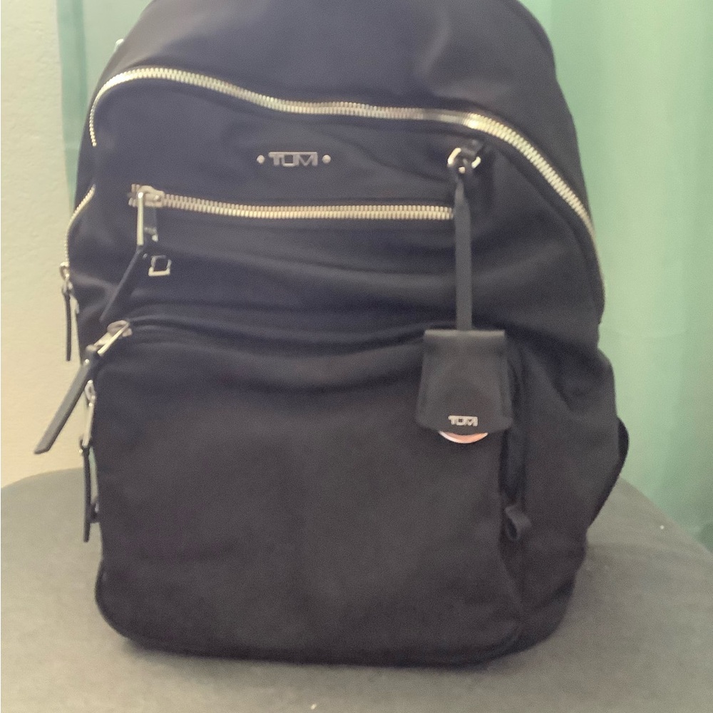 Tumi Black Backpack with silver hardware